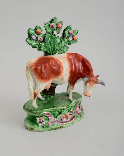 STAFFORDSHIRE PEARLWARE FIGURE OF A COW