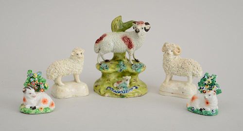 TWO PAIRS OF PEARLWARE SHEEP AND A SINGLE PEARLWARE RAM