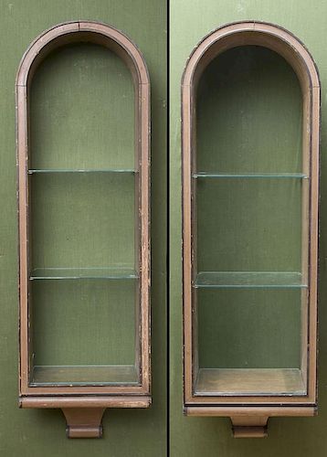 PAIR OF REGENCY STYLE PAINTED HANGING COVERED SHELVES