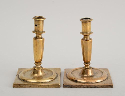 PAIR OF CONTINENTAL BAROQUE BELL METAL CANDLESTICKS, POSSIBLY SPANISH