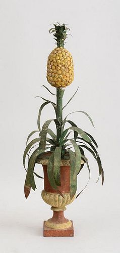 CONTINENTAL TÔLE PEINTE AND PAINTED CAST-IRON POTTED PINEAPPLE