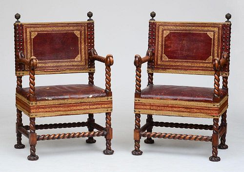 PAIR OF FLEMISH BAROQUE STYLE STAINED WALNUT AND LEATHER ARMCHAIRS