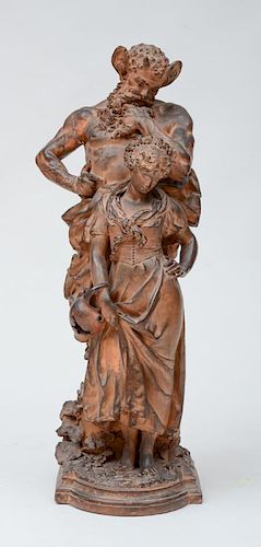 CONTINENTAL TERRACOTTA FIGURE GROUP OF A SATYR AND A SHEPHERDDESS