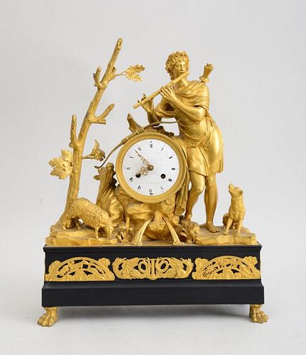 LOUIS XVI STYLE GILT-BRONZE AND PATINATED-BRONZE FIGURAL MANTLE CLOCK