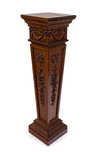 Neoclassical pedestal, late 19th century. 
Carved wood.