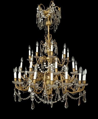 Napoleon III ceiling lamp, ca.1850. 
In gilt bronze and crystal. 
32 lights.