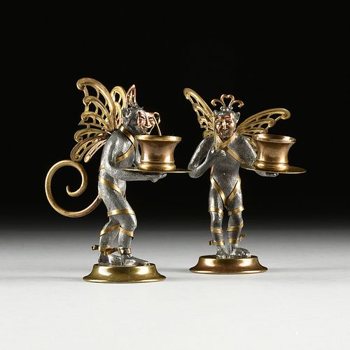 A PAIR OF MARDI GRAS/CARNIVAL THEATRICAL BRASS AND LEAD MONKEY CANDLE STANDS, MODERN,