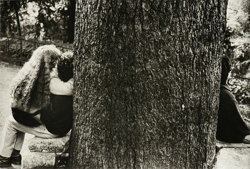 Ã‰DOUARD BOUBAT (French 1923-1999) A PHOTOGRAPH, "Tree Trunk with People," "