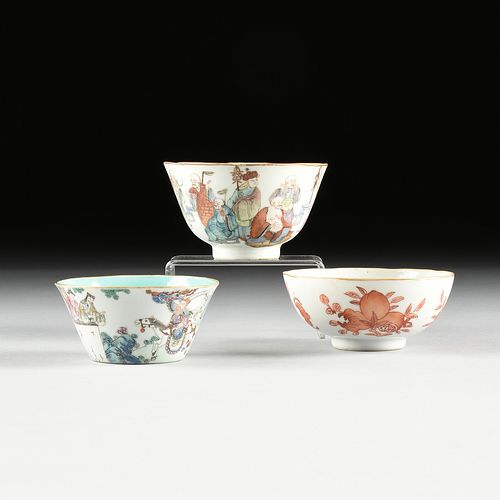 A GROUP OF THREE QING DYNASTY PORCELAIN TEA BOWLS, 1644-1912,