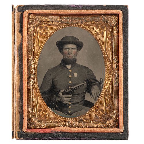 [CIVIL WAR]. Ninth plate tintype of Union infantry private displaying Star Army revolver. N.p.: n.p., [1860s].