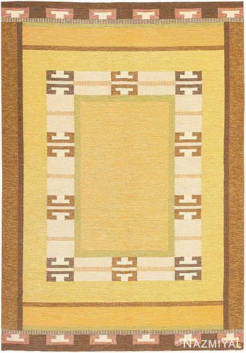 VINTAGE SWEDISH FLATWOVEN CARPET DESIGNED BY INGEGERD SILOW, SIGNED ‘IS’. 9 ft 2 in x 6 ft 5 in (2.79 m x 1.96 m).