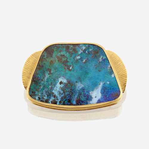 A boulder opal and gold enhancer
