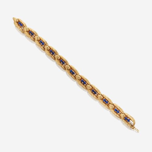 An eighteen karat gold and lapis lazuli bracelet, Cartier Paris