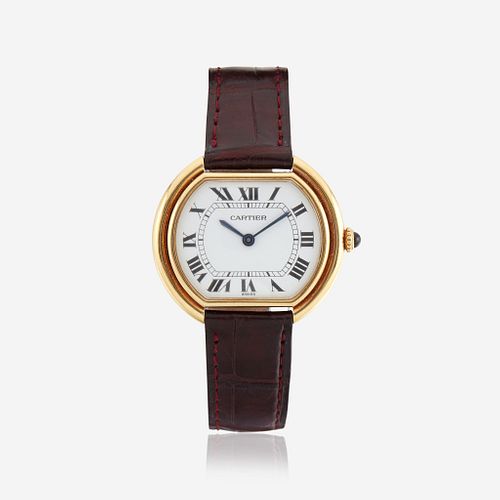 An eighteen karat gold watch, Cartier