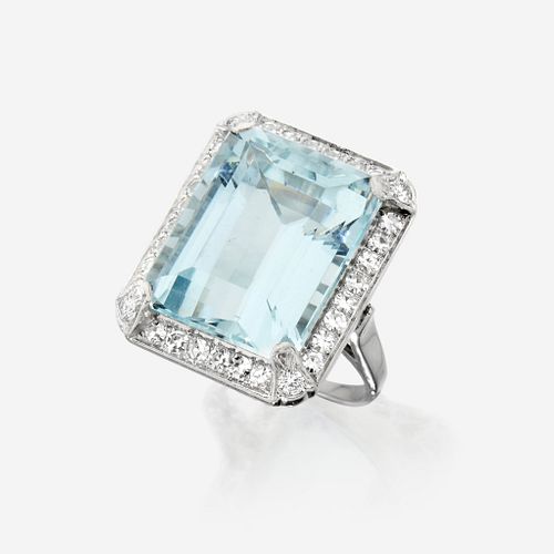 An aquamarine, diamond, and platinum ring