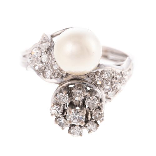 A Mid-Century Pearl & Diamond Bypass Ring in 18K