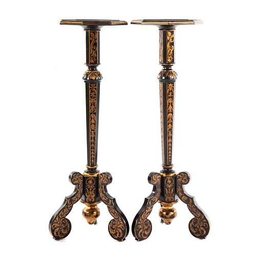 A Pair of Edwardian Style Ebonized Pedestal Stands