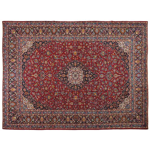 PERSIAN KASHAN KASHAN, IRAN. Ca. 1960. Finely knotted by hand with natural dyes, in red, blue and beige. 159.8 x 118.1" (406 x 300 cm)