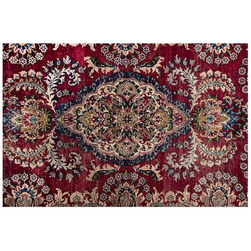 PERSIAN KERMAN Ca. 1900 Handmade in pile of wool on a cotton base with natural dyes. 70.8 x 51.1" (180 x 130 cm)