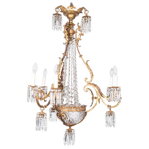 CHANDELIER 20TH CENTURY Made of bronze with prisms and faceted glass pendants for 15 electric lights.47.2 x 30.3" (120 x 77 cm)