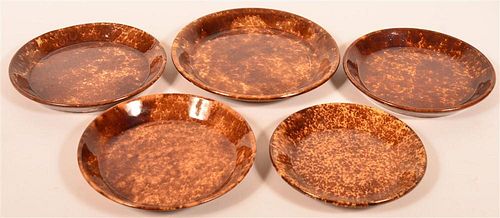 Five Rockingham Glazed Yellowware Plates.