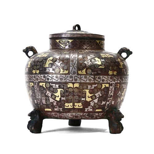 A GOLD AND SILVER-INLAID TRIPOD POT WITH COVER