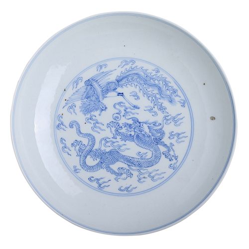 A BLUE AND WHITE 'DRAGON AND PHOENIX' DISH