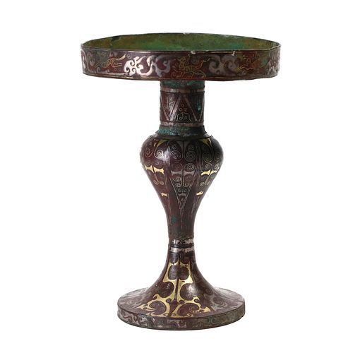 A GOLD AND SILVER-INLAID BRONZE OIL LAMP 