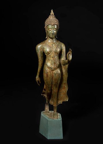 Sukhothai Walking Buddha, Sukhothai Period, 14th-15th centuries.
Bronze with remains of polychrome. Wooden base.