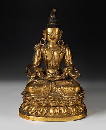 Amitayus Buddha. Tibet, 17th-18th century.
Mercury gilt bronze, with semi-precious stones.