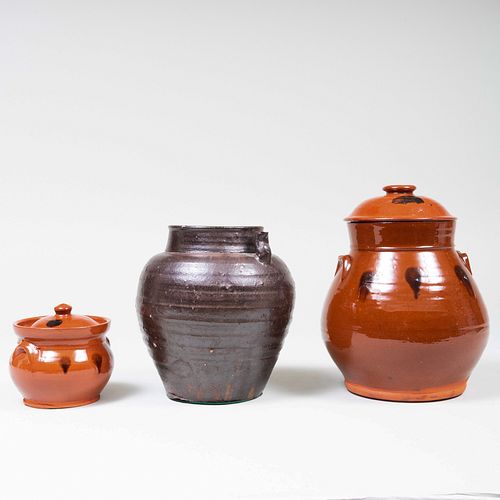 Two American Redware Cannister and Covers and an Earthenware Vessel