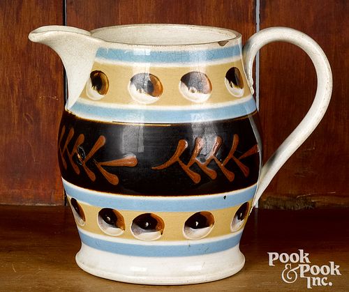 Mocha pitcher, with cat's-eye and twig decoration