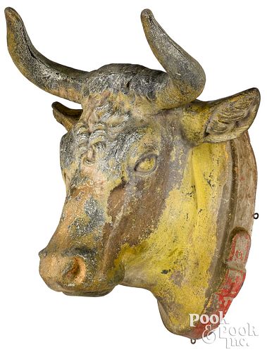 Painted zinc cow head trade sign, 19th c.