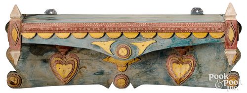 Painted tramp art hanging shelf, ca. 1900, with a