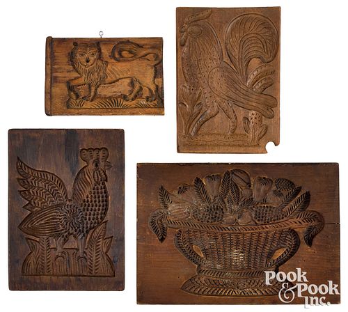 Four assorted carved cakeboards