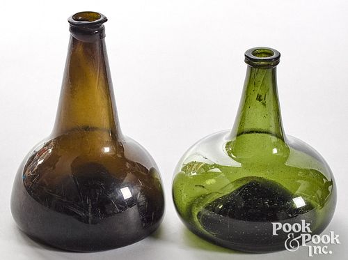 Two olive glass squat bottles, late 18th c.