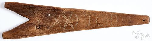 Carved bootjack, dated 1818