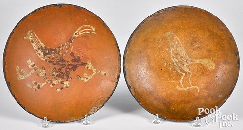 Two Pennsylvania redware chargers, 19th c.