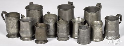 Twelve English pewter measures, 18th/19th c., tall