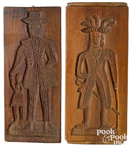 Two Dutch carved cakeboards, 19th c., with double