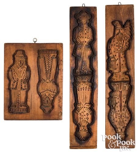 Three Dutch carved cakeboards, 19th c., with figur