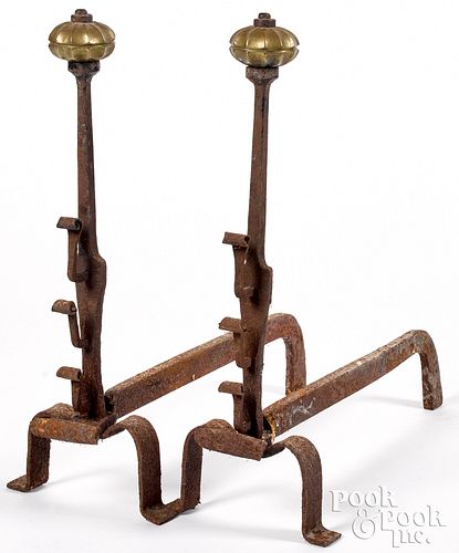Pair of Continental wrought iron andirons, 17th c.