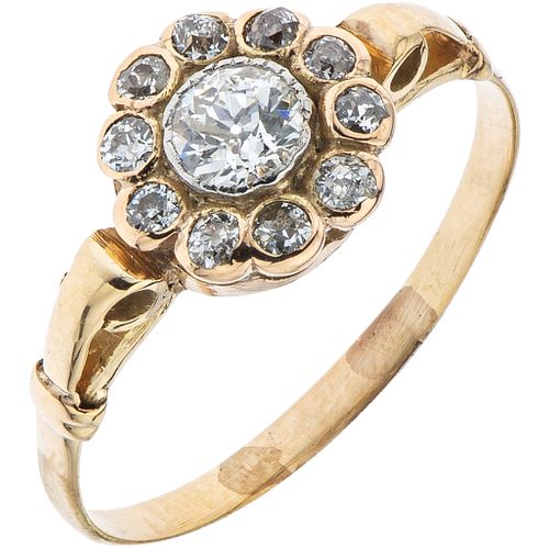 RING WITH DIAMONDS IN 14K YELLOW GOLD 1 Antique cut diamond ~0.25 ct Clarity: SI2 and antique cut diamonds ~0.25 ct