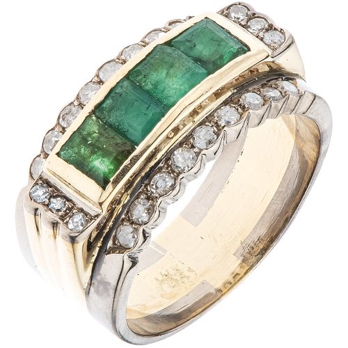 RING WITH EMERALDS AND DIAMONDS IN 18K YELLOW GOLD AND PALLADIUM SILVER Emeralds ~0.80 ct and diamonds ~0.40 ct. Weight: 11.3 g