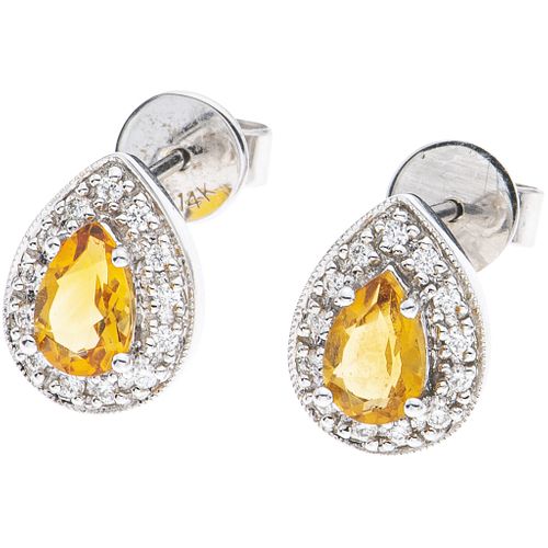PAIR OF STUD EARRINGS WITH CITRINES AND DIAMONDS IN 14K WHITE GOLD Pear cut citrines ~0.80 ct, Brilliant cut diamonds ~0.08 ct