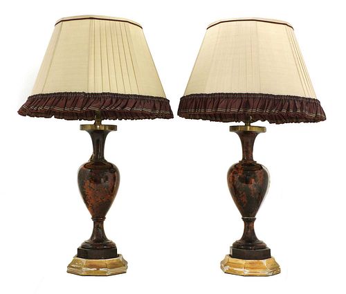 A pair of polished hardstone table lamps,