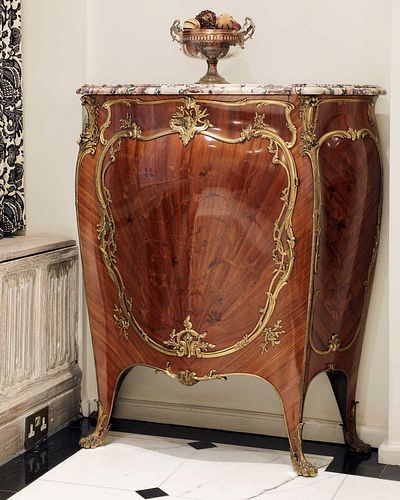 A French Louis XV-style amaranth and kingwood meuble d'appui,