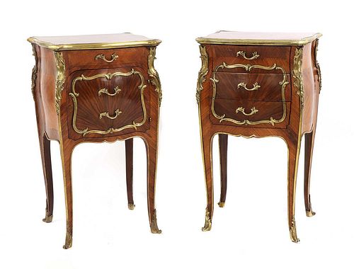 A pair of French Louis XV-style kingwood and ormolu night tables,