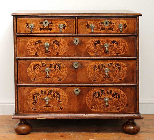 A William and Mary marquetry inlaid walnut chest of drawers,