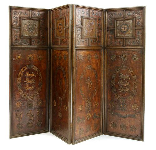 An oak and embossed leather four-fold screen,